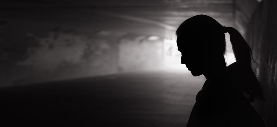 Profile image of a female in a tunnel