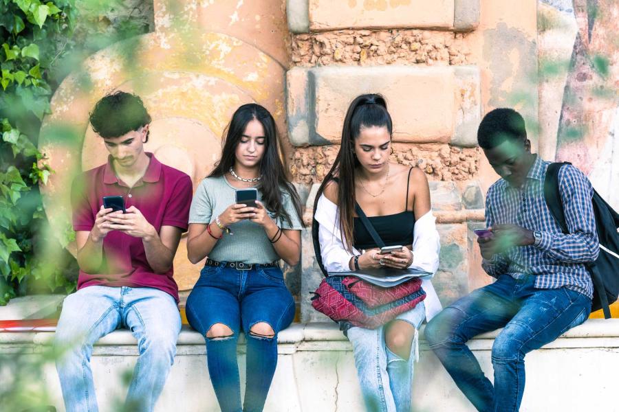 Youth using their mobile devices